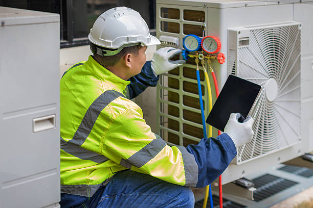 Professional Hvac technician working in Asbury, IA